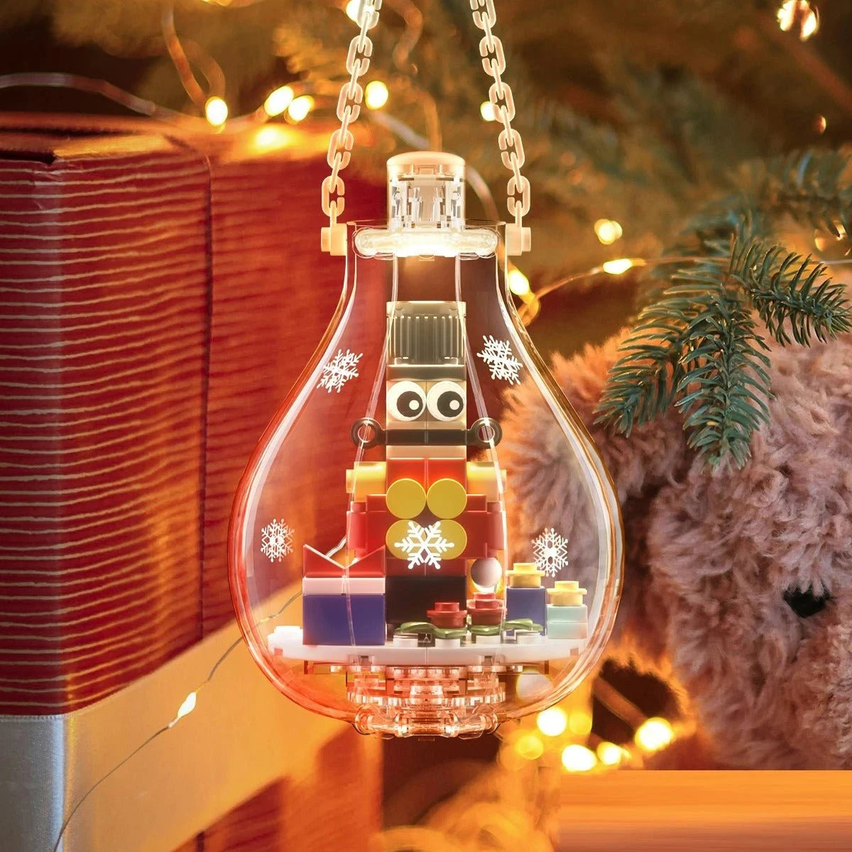 Boule de Noël lumineuse avec figurine casse-noisette en briques