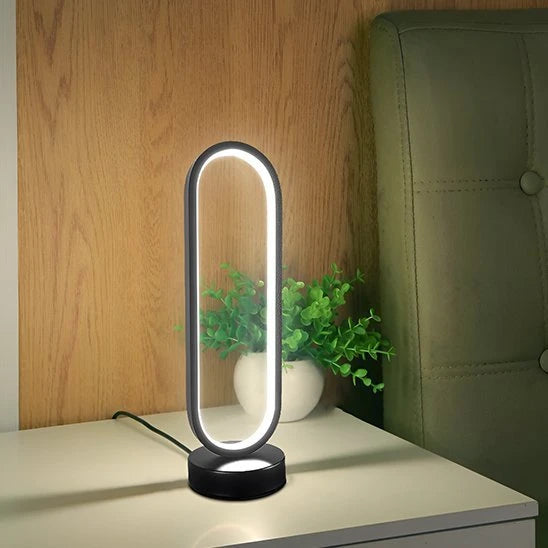 Lampe de table LED ovale noire lumière blanche neutre meuble bois plante verte — Mon Univers - Mes Lumières