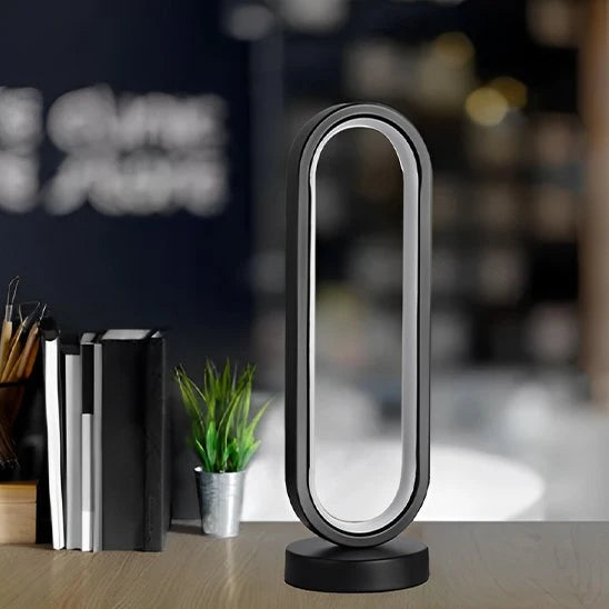 Lampe de table LED ovale noire éteinte fond sombre bureau design minimaliste — Mon Univers - Mes Lumières